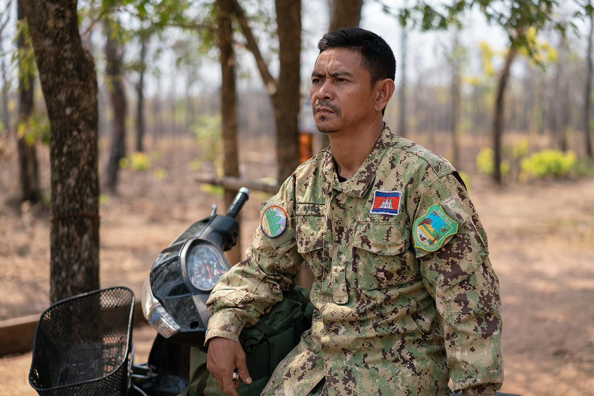 Ranger Sothear Chheng on Motorbike Patrol in Mureuch