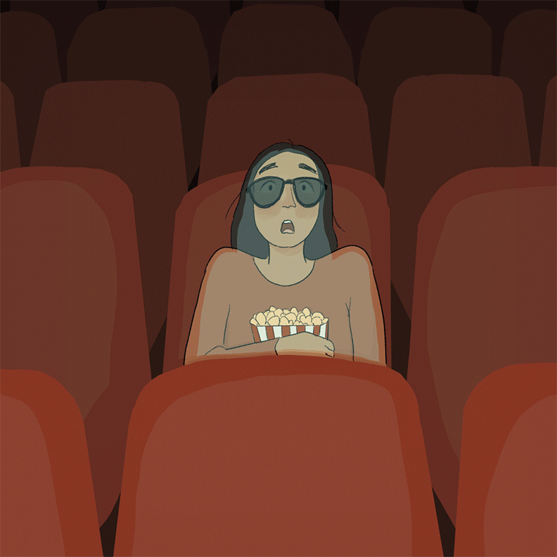 A young Blaise is in the cinema - two “scary” hands appear in front of her.